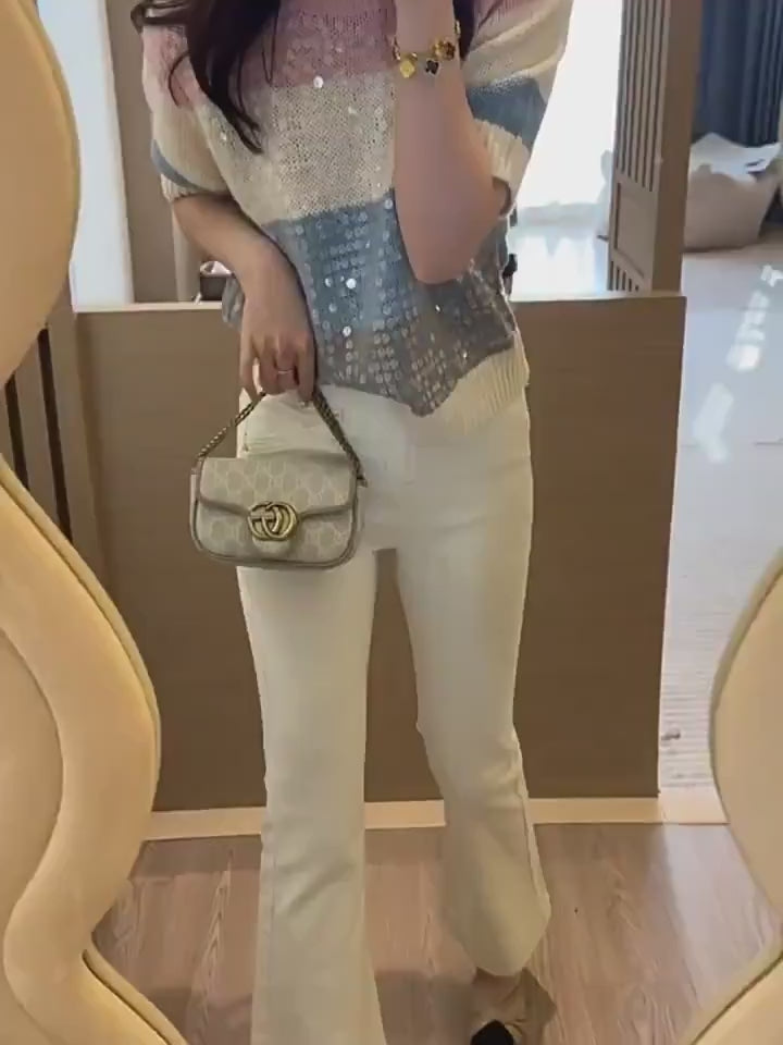 Luxe Stripes – Blusa Listrada com Lantejoulas Elegante e Versátil